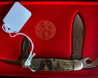 The official Boy Scout knife in the original box.