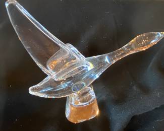 Another Steuben glass figurine.  The gold cast in the picture is a function of glass from the light.