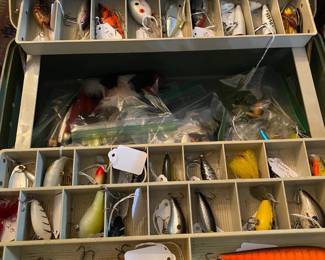 Plano 3 tier tackle box full of lures.