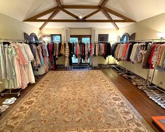 12 Racks full of designer and vintage clothing
