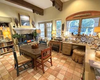 Breakfast room with primitive dining room table and (4) vintage rolling Mexican chairs with rush seats