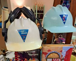 St. Joseph collectibles. "St. Joseph Light and Power Reddy Kilowatt" worksite helmets