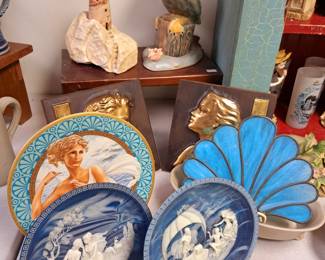 Much, much collectibles.  Stain glass, collectors plates