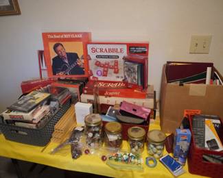 games, records, puzzles, office supplies, marbles, buttons