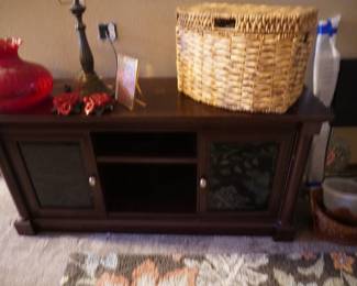 TV cabinet, basket. lamp