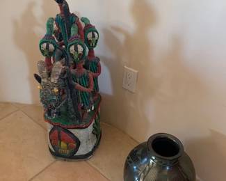 Vintage Yoruba beaded headdress and Lucie Zete Mata Ortiz pot on stand