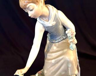 Lladro Girl Picking Up Flowers