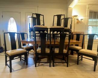 Asian style Dining Table, measures 78“ x 43.5“ x 29.5“ with two additional leaves 22" each. 12 Dining chairs, 2 captain arm chairs; measure 19"to seat cushions, 40" to chair back tops.