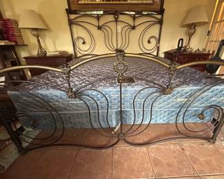 King size bed w/ornate iron frame