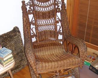Antique Wicker rocker- I believe it is made by Heywood Wakefield