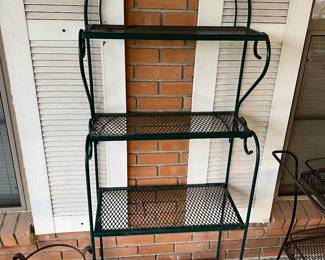 Vintage green wrought iron bakers rack for plants