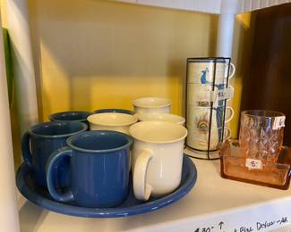 More of blue  & white dishes, pink dishes & cup holder with cups 