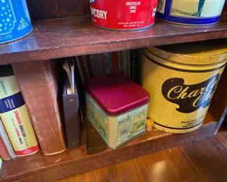 Bookcase & collectible cans 