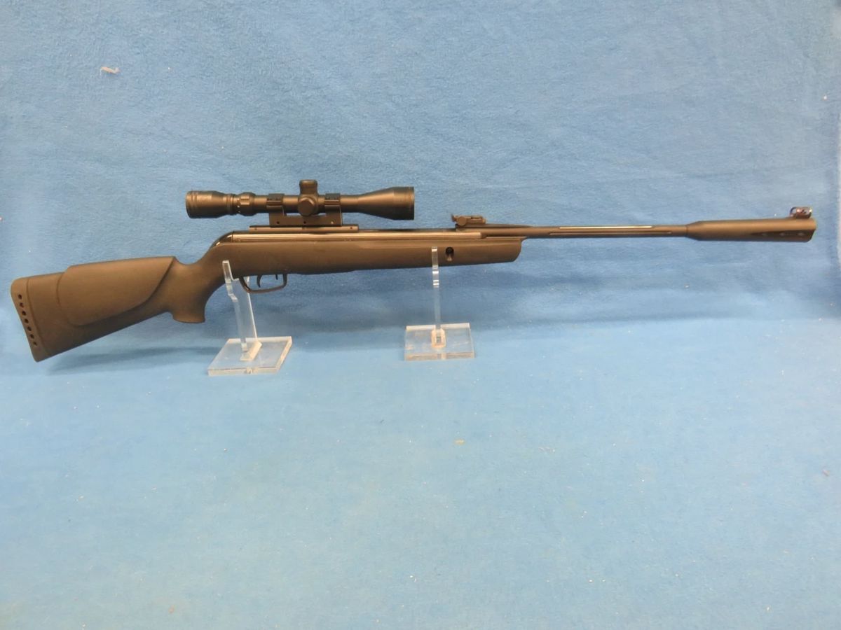 Lot 9. Gamo Whisper .177 break-barrel pellet gun with a Gamo 3 x 9 40mm scope. 1200 feet per second.