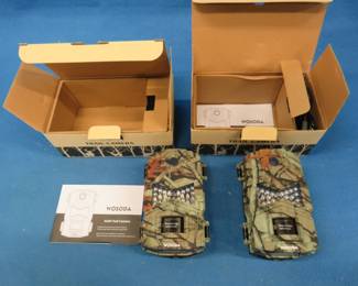Lot 378. Two NIP Wosoda G200 trail cameras and a used Moultrie trail camera