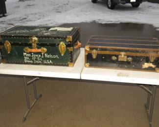 Lot 385. Two vintage steamer trunks. Smaller one is locked but appears to be empty.