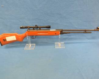 Lot 28. Break-barrel .177 cal. pellet rifle with a Daisy scope. Unknown manufacturer.