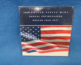 Lot 417. Sealed 2008 US Mint Uncirculated Dollar Coin Set including a Silver Eagle. 31.03 grams of .999 silver.