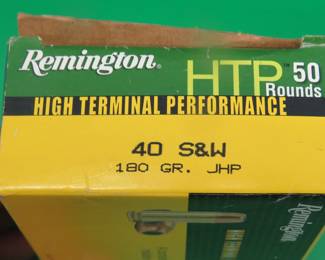 Lot 246. One box of 50 Remington HTP 40 S&W rounds