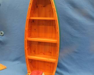 Lot 374. Wooden boat display shelf 44" x 15" x 6 1/2" and a ceramic woody cookie jar