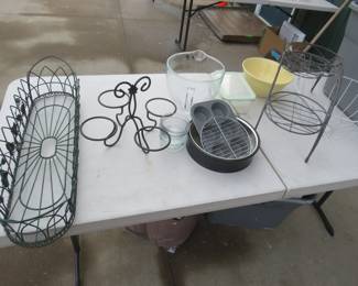 Lot 301. Metal plant containers, KitchenAid glass mixing bowl, muffin tins, and more includes a tote with lid to carry it all in.