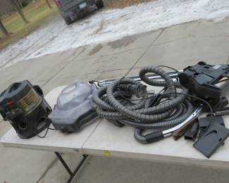 Lot 334. Rainbow water filter vacuum system with floor and furniture heads. Untested, but Seller said it is complete and works great.