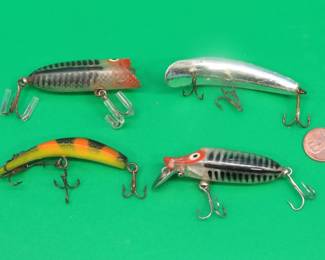 Lot 103. Heddon Baby Lucky 13 and River Runt and two Flatfish-style baits