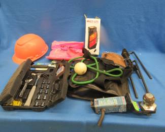 Lot 203. Trailer hitch with a 2" ball, tools, car care items, and more