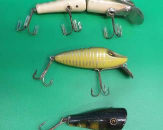 Lot 167. Paw Paw 4 1/4" Famous Pikie Getum with tack eyes, Paul Bunyan Weaver, and a CCBC Midgit Plunker with glass eyes.