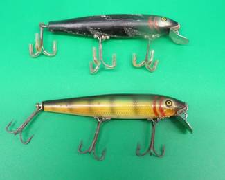 Lot 104. Two Pflueger 4 1/4" Mustang Minnows, one with glass eyes