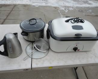 Lot 329. Like-new Rival Top Browning Roaster Oven, and a Rival crock pot