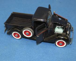 Lot 70. Danbury Mint 1935 Ford pickup. 1:24 scale die-cast truck with original box.