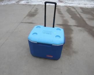 Lot 294. Highchair and a rolling Coleman cooler