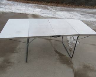 Lot 292. Folding aluminum table. 72" x 20".