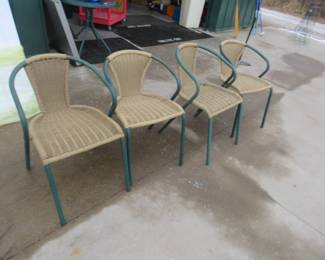 Lot 302. Four patio chairs