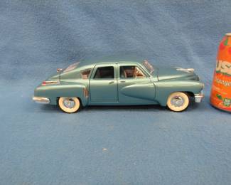 Lot 77. Road Signature 1948 Tucker Torpedo. 1:18 scale die-cast car.