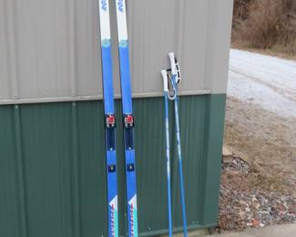 Lot 297. Rossignol Advantage 77" waxless cross-country skies, poles, and size 7 1/2 boots
