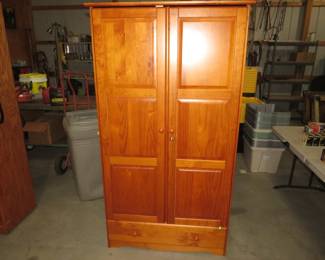 Lot 323. Free-standing wardrobe with adjustable shelves and a drawer. 72" X 39" X 12".