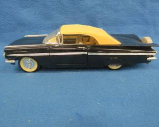 Lot 272. Road Tough 1959 Chevrolet Impala convertible. 1:18 scale die-cast car.