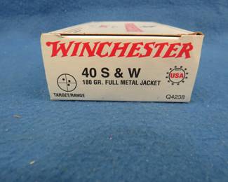 Lot 367. Winchester 40 S & W. 180-grain FMJ. Full box of 50 rounds.