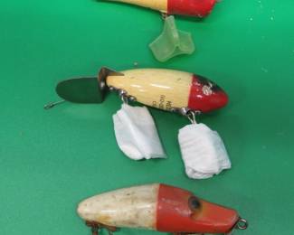 Lot 66. Heddon wooden Go-Deeper crab, Wright & Mc Gill Eagle Claw Hijacker, and a J.C. Higgins wooden Plunker
