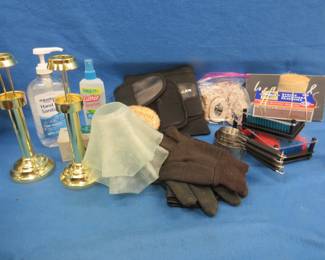 Lot 267. Back brace, measuring cups, candlesticks, and more