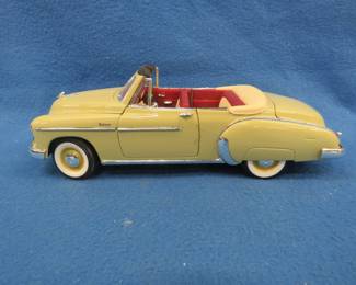 Lot 75. Mira 1950 Chevrolet Bel Air convertible. 1:18 scale die-cast car with original box.
