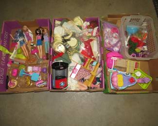 Lot 359. Three large flats with dolls, doll clothes, toys, and more