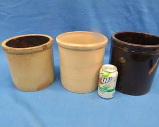 Lot 135. Three approx. one-gallon crocks including salt glaze