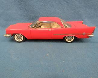 Lot 79. American Muscle 1957 Chrysler 300C hardtop. 1:18 scale die-cast car.