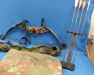 Lot 138. PSE compound Fire-Flite right-handed 29" 60 lb. bow with a trigger release, case, quiver and four broadhead arrows.