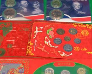 Lot 187. 1995 and 1996 Singapore uncirculated coin sets - Hongbao Packs, and 2007 Jefferson and Adams Presidential $1.00 coins and First Spouse medals.