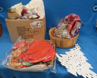 Lot 375. Ribbon bows, large glass vase, blankets, and Christmas and Halloween decorations