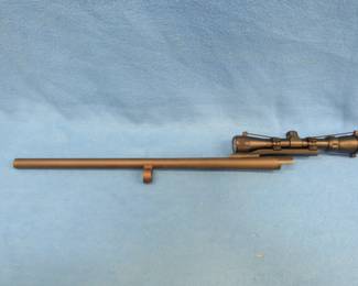 Lot 144. Rifled 23" barrel for an 870 Remington 12-gauge with a 2-7x32 scope
